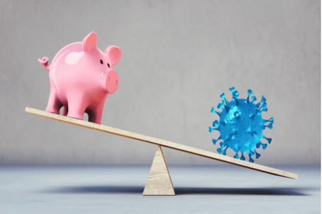 Piggy bank on scale with Coronavirus