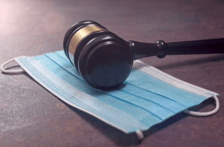 Medical Mask and Judge's Gavel