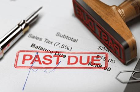 Balance sheet with red "past due" stamped