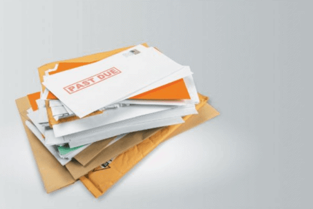 pile of past due bills