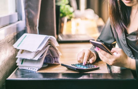 woman using calculator