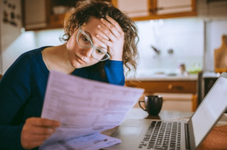 woman stressed holding document