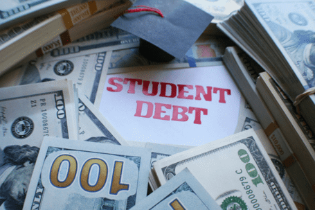 student debt sign in a pile of money