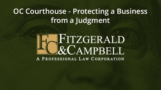 Fitzgerald & Campbell logo over faded watermark image