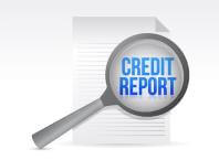 Magnifying glass over "credit report" title