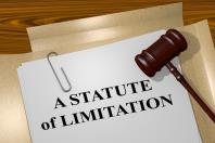 Gavel on top of "A Statue of Limitation" paper