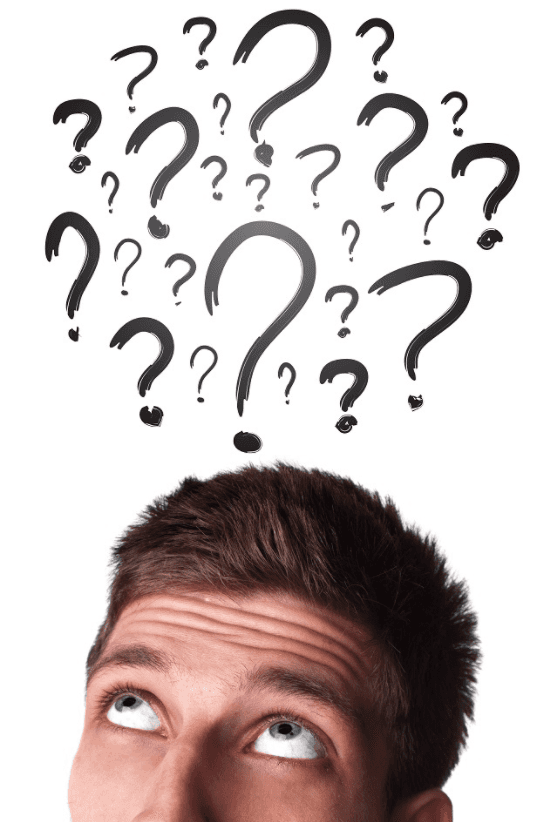 Man looking up at questions marks painted above his head