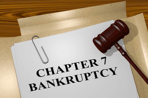 Chapter 7 Bankruptcy paper with judge's gavel on top of it