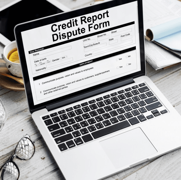 Credit Report Dispute form opened on the screen of a laptop