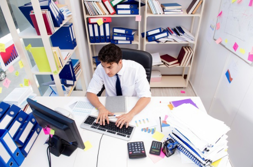 Man working on a computer at his desk