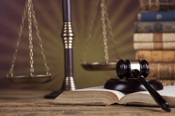 Gavel, scales of justice, and stack of books