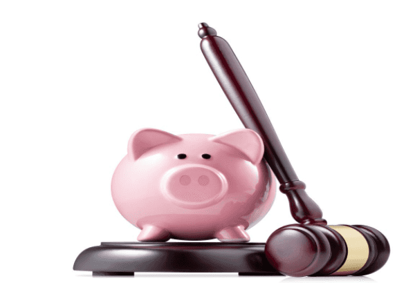 Piggy bank and judge's gavel 
